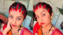 The bride made multiple partings in her hair, filling each with vermilion, creating a striking application.